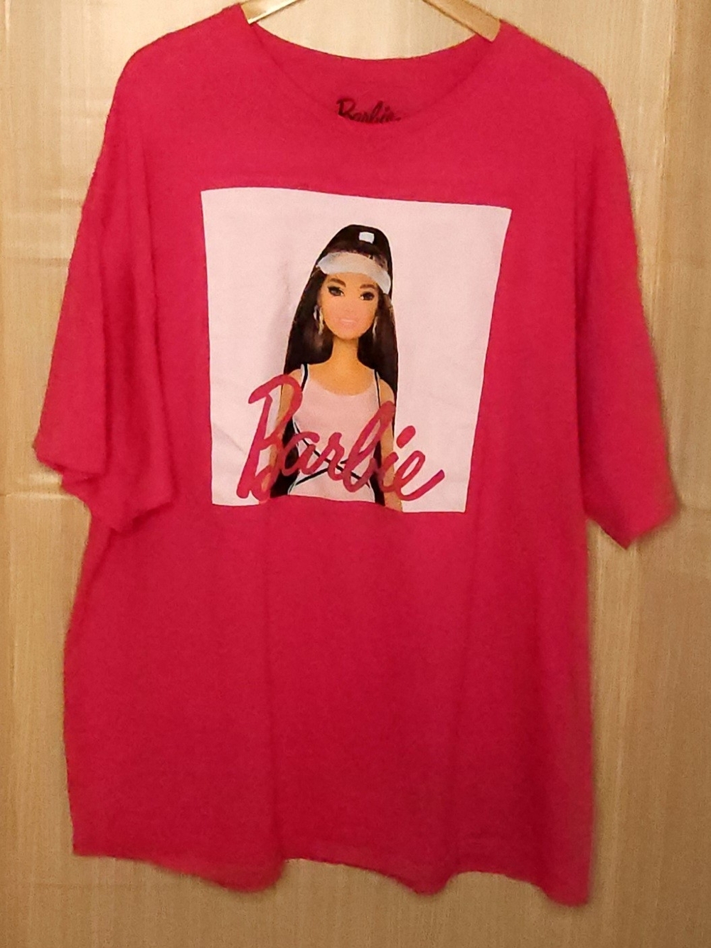 Barbie women’s plus pink short sleeve oversized top 2X